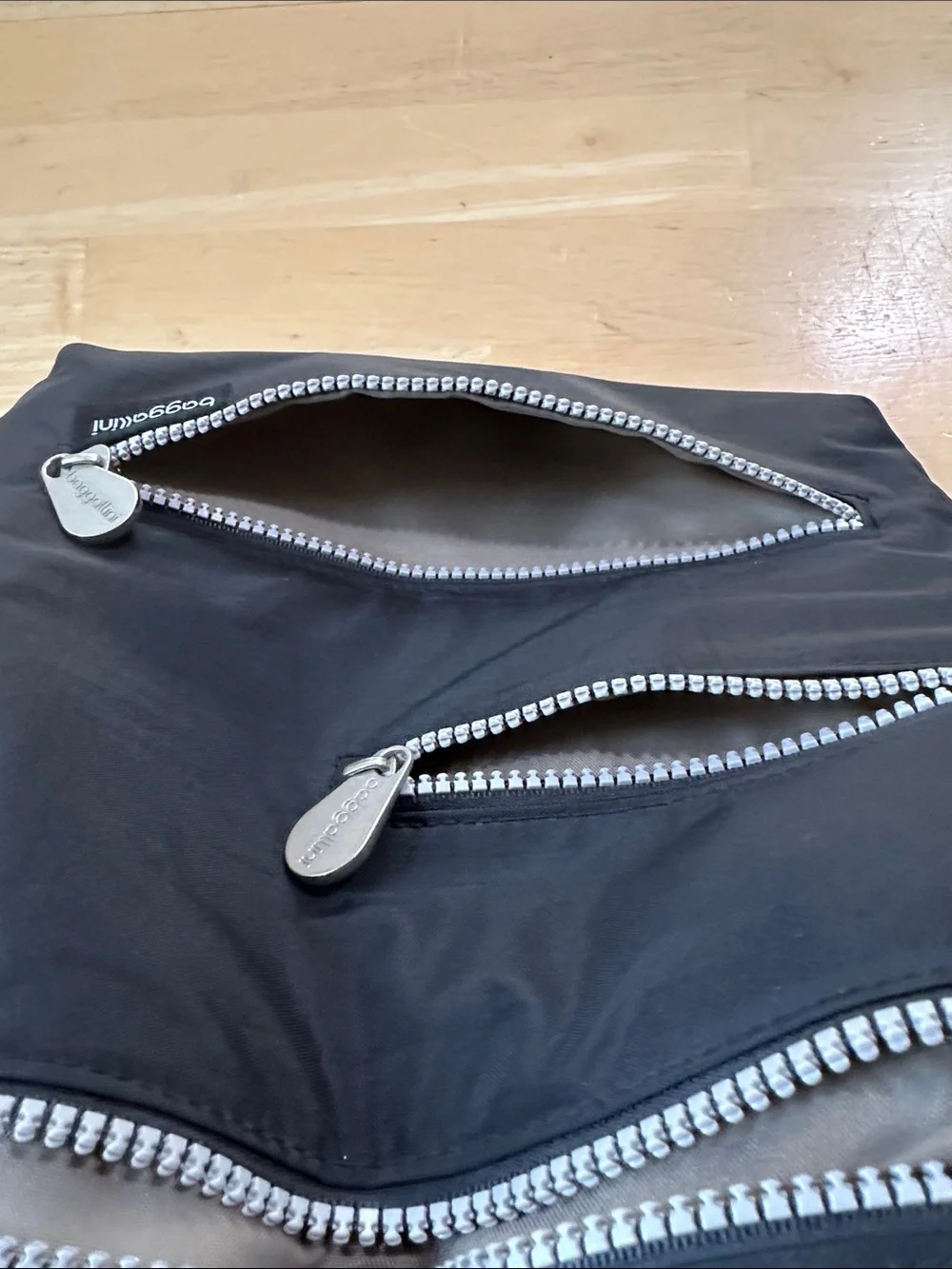 Baggallini Black Crossbody Sling with Silver Zippers